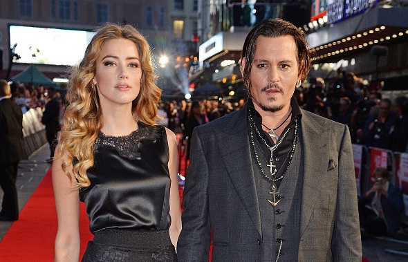 La coppia Johnny Depp e Amber Heard immortalata dal fotografo Dave J Hogan