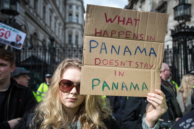 Protestors at the 'David Cameron: close tax loopholes or resign!' demonstration at Downing street Panama Papers demonstration 'David Cameron: close tax loopholes or resign!', Whitehall, London, Britain - 09 Apr 2016 9 April 2016 (Rex Features via AP Images)